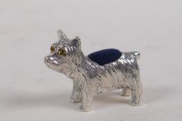 A sterling silver miniature pin cushion in the form of a dog, 3cm long