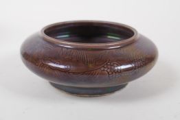 A brown glazed porcelain ink wash with incised dragon decoration, Chinese Chenghua 6 character
