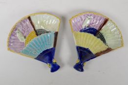 A pair of late C19th/early C20th Majolica fan shaped dishes with an oval design, 19cm x 20cm