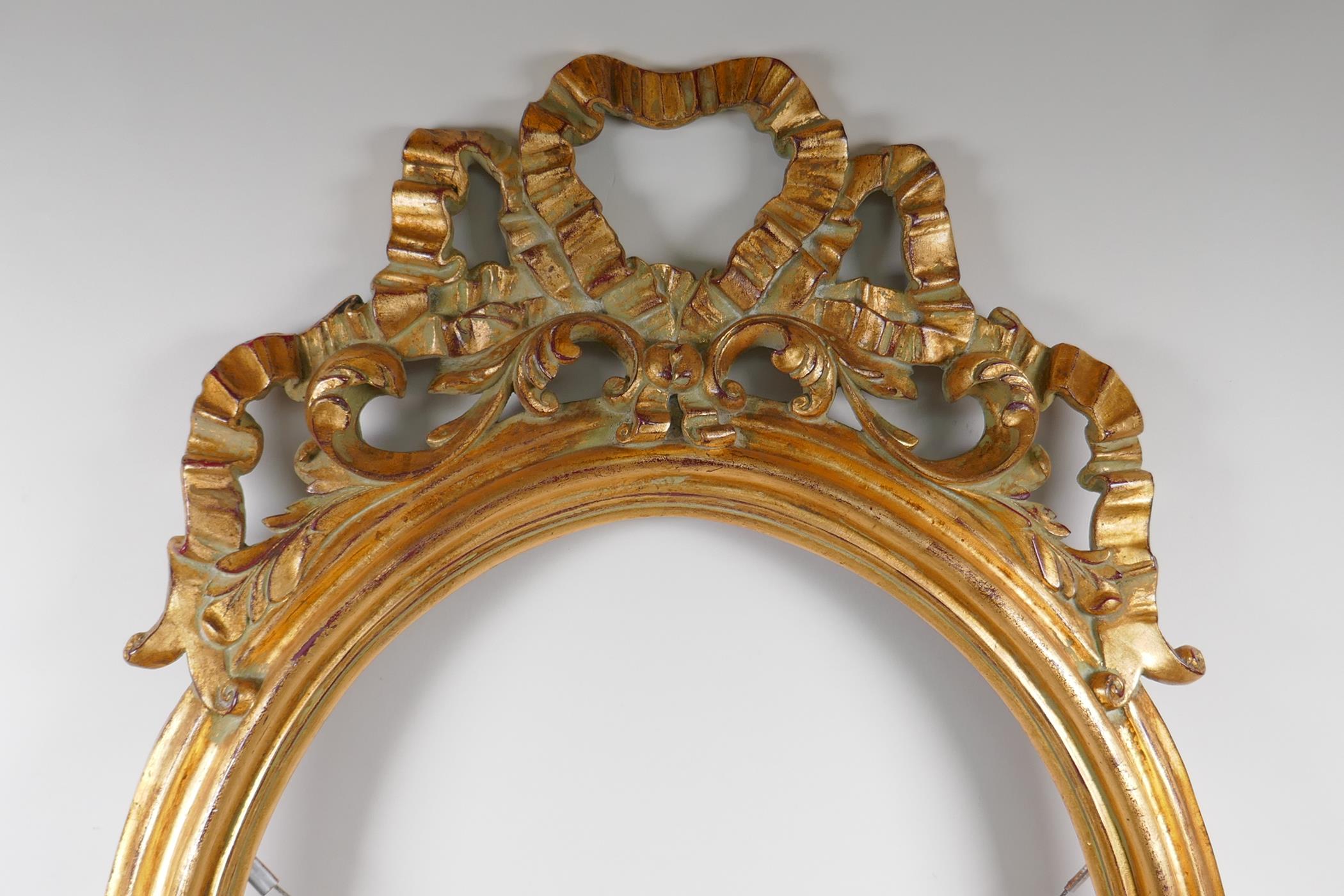 A gilt composition wall mirror, 85cm x 57cm - Image 2 of 3