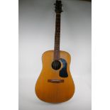 A Washburn model Dion acoustic guitar, 102cm long