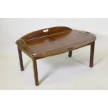 A mahogany butler's tray and stand, extended 119 x 80 x 43cm