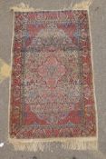 A Persian multi colour Heriz design silk rug, wear, 38½" x 60"