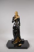 An Art Deco style cold painted bronze figure of a woman with feather fan, on a polished stone