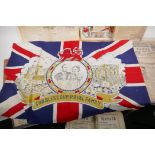 A collection of Royal Commemorative memorabilia including a Coronation flag and editions of Surrey