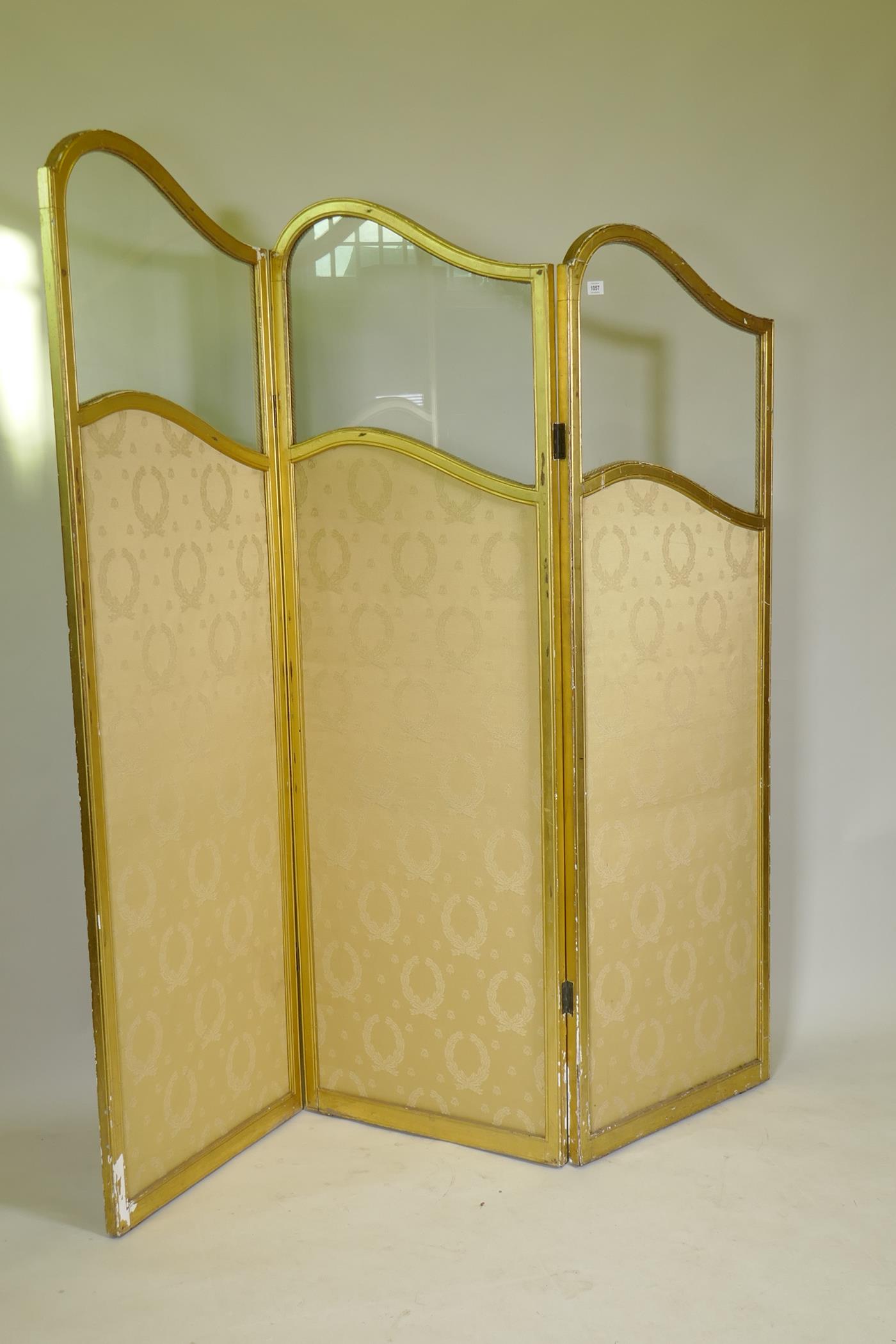 A late C19th French three fold gilt wood screen, with glazed and shaped top, 176cm high, each