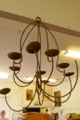 A wrought iron ten branch chandelier, AF, 34" drop