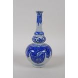 A Chinese blue and white porcelain stem vase with stylised floral decoration, mark to base, 18cm