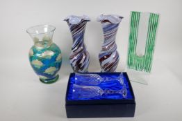 A studio glass specimen vase, 35cm high, a pair of swirled glass vases, an enamelled glass vase