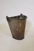 A metal half bucket wall planter with iron swing handle, 32cm high