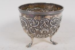 A small Georgian embossed silver three footed bowl, HM Dublin 1801, 98g