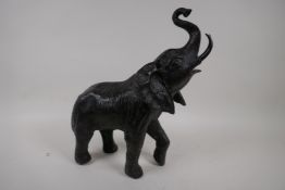 A bronze figure of an elephant, 13" high