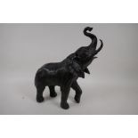 A bronze figure of an elephant, 13" high