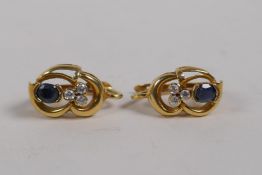 A pair of 14ct yellow gold and sapphire earrings, unmarked