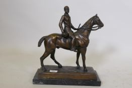 After Joseph Edgar Boehm, a bronze figure of a huntsman on his mount, 'Captain Anstruther Thomson on