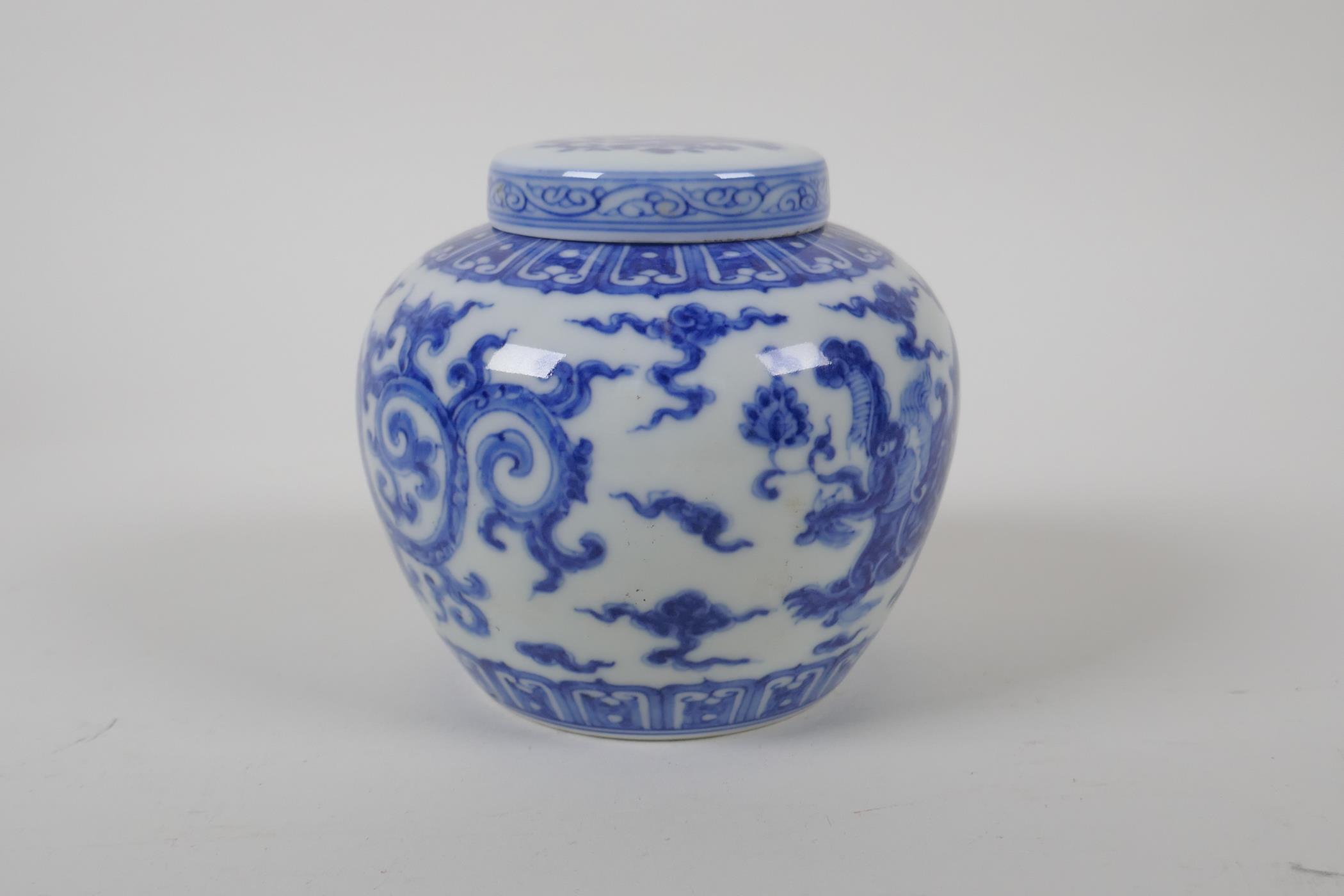A Chinese blue and white porcelain ginger jar and cover, with scrolling dragon decoration, character - Image 2 of 7