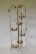 A vintage French gold painted metal folding jardiniere stand with grape and vine decoration, 160cm