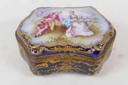 A French Sevres porcelain cushion shaped trinket box hand painted with a romantic couple and lake