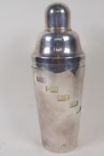 A Napier style silver plated cocktail shaker with patent design showing recipes for fourteen classic