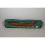 A decorative late C20th painted wood half hull model of a sailing ship, 67cm long