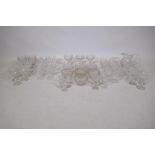 A large part suite of drinking glasses with etched vine decoration and cut details, consisting of