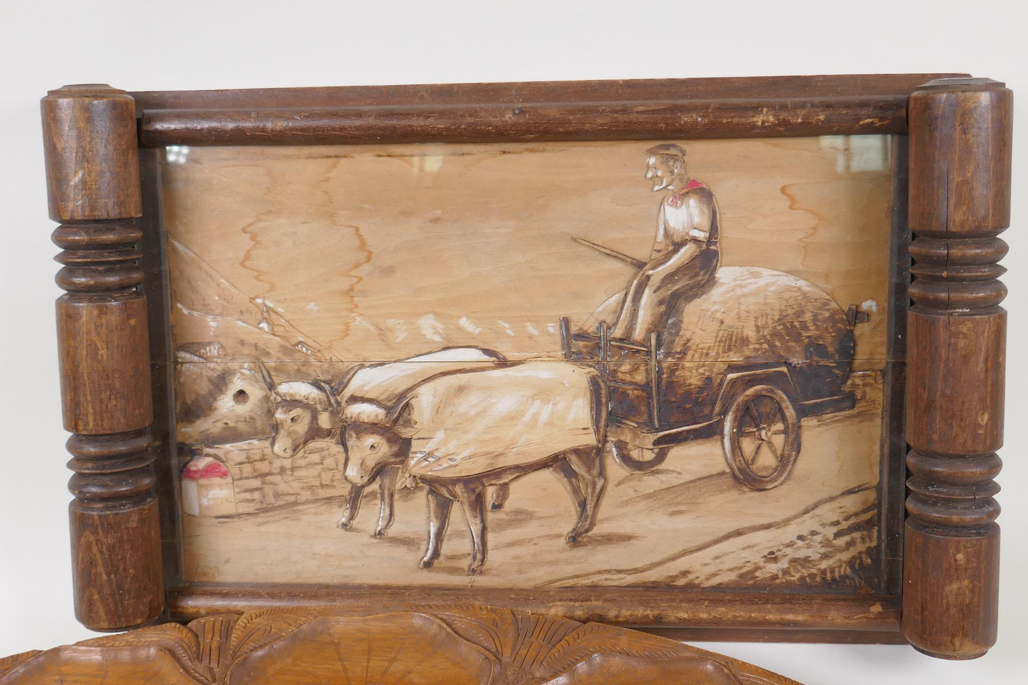A vintage European carved wooden tray decorated with a naive scene of a man driving a bullock - Image 4 of 4