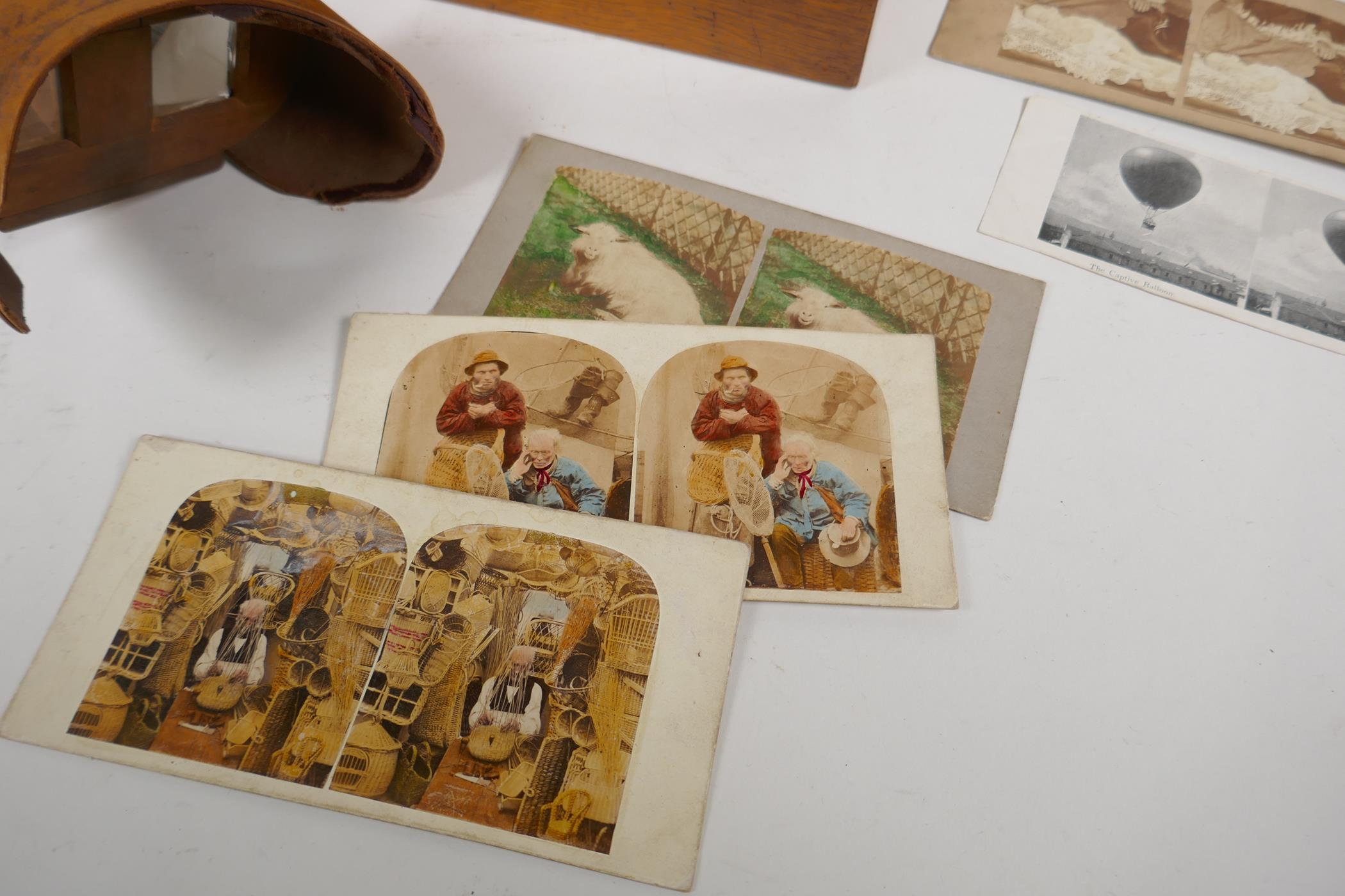 An early C20th stereoscopic viewer, and a boxed collection of viewer cards depicting various - Image 4 of 6