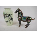 An Oriental cloisonne vase decorated with a bird on a flowering branch, 22cm high, and a brightly