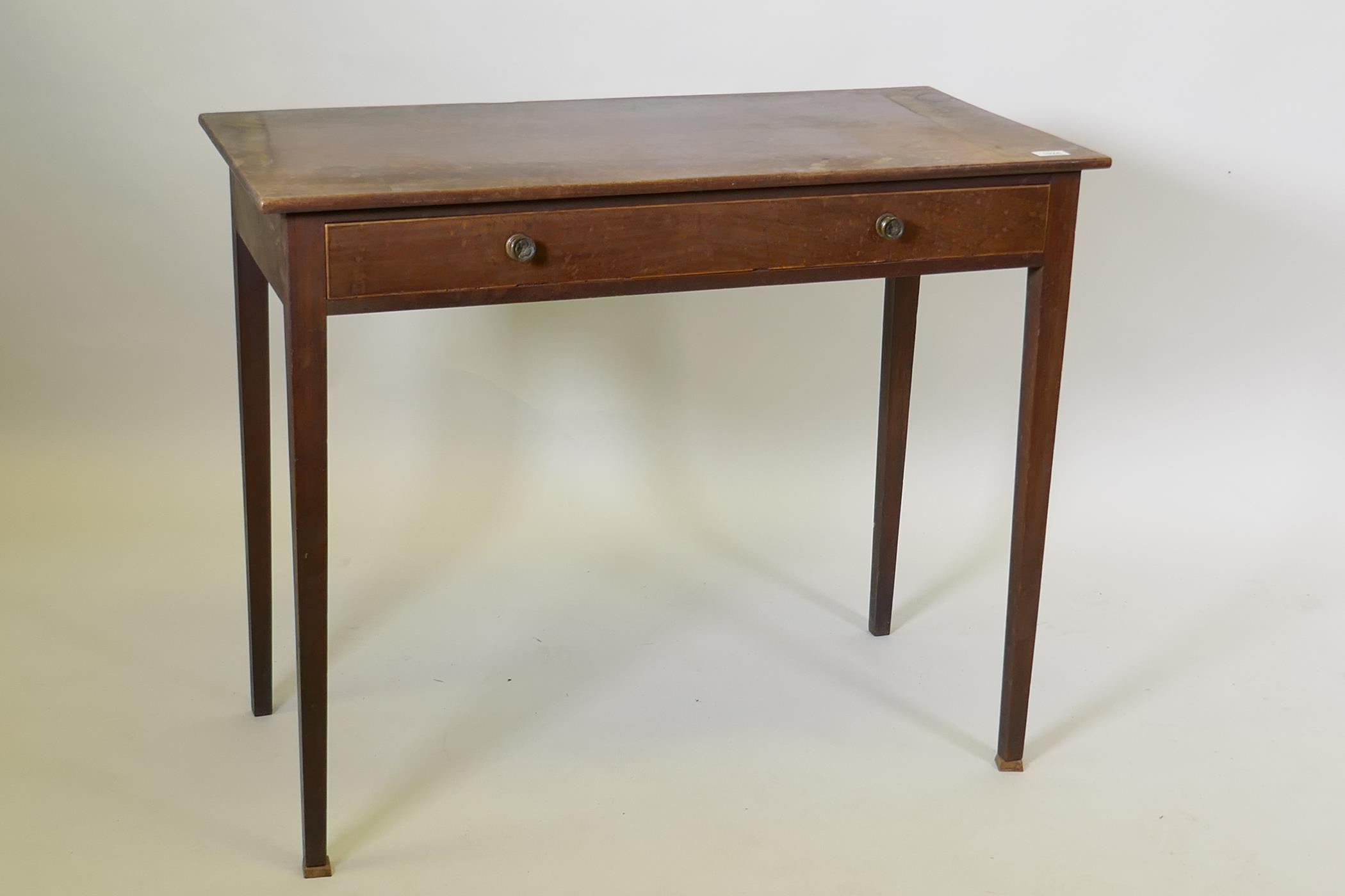 A George III mahogany single drawer side/writing table, raised on square tapering supports, 94 x