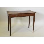 A George III mahogany single drawer side/writing table, raised on square tapering supports, 94 x