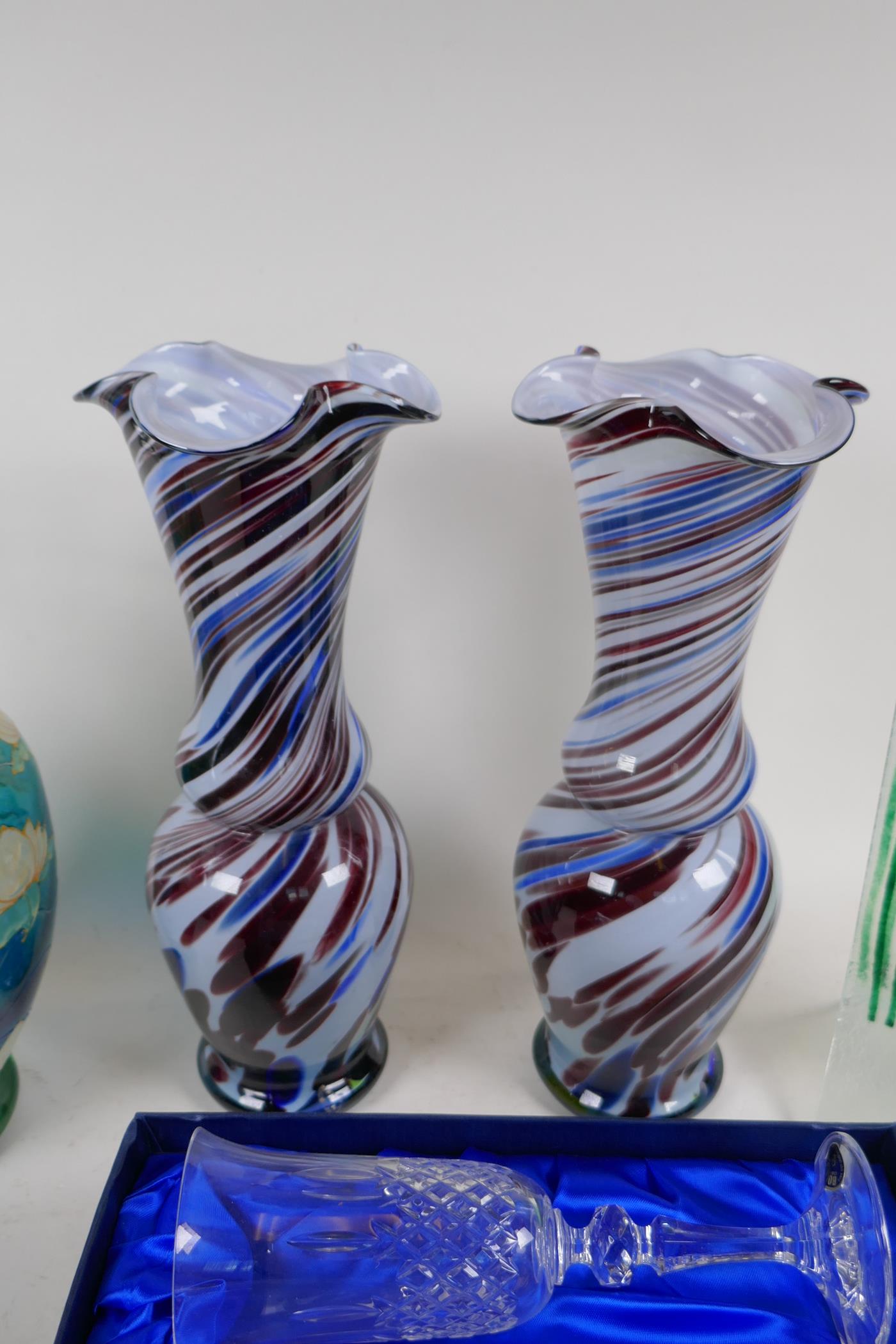 A studio glass specimen vase, 35cm high, a pair of swirled glass vases, an enamelled glass vase - Image 3 of 5