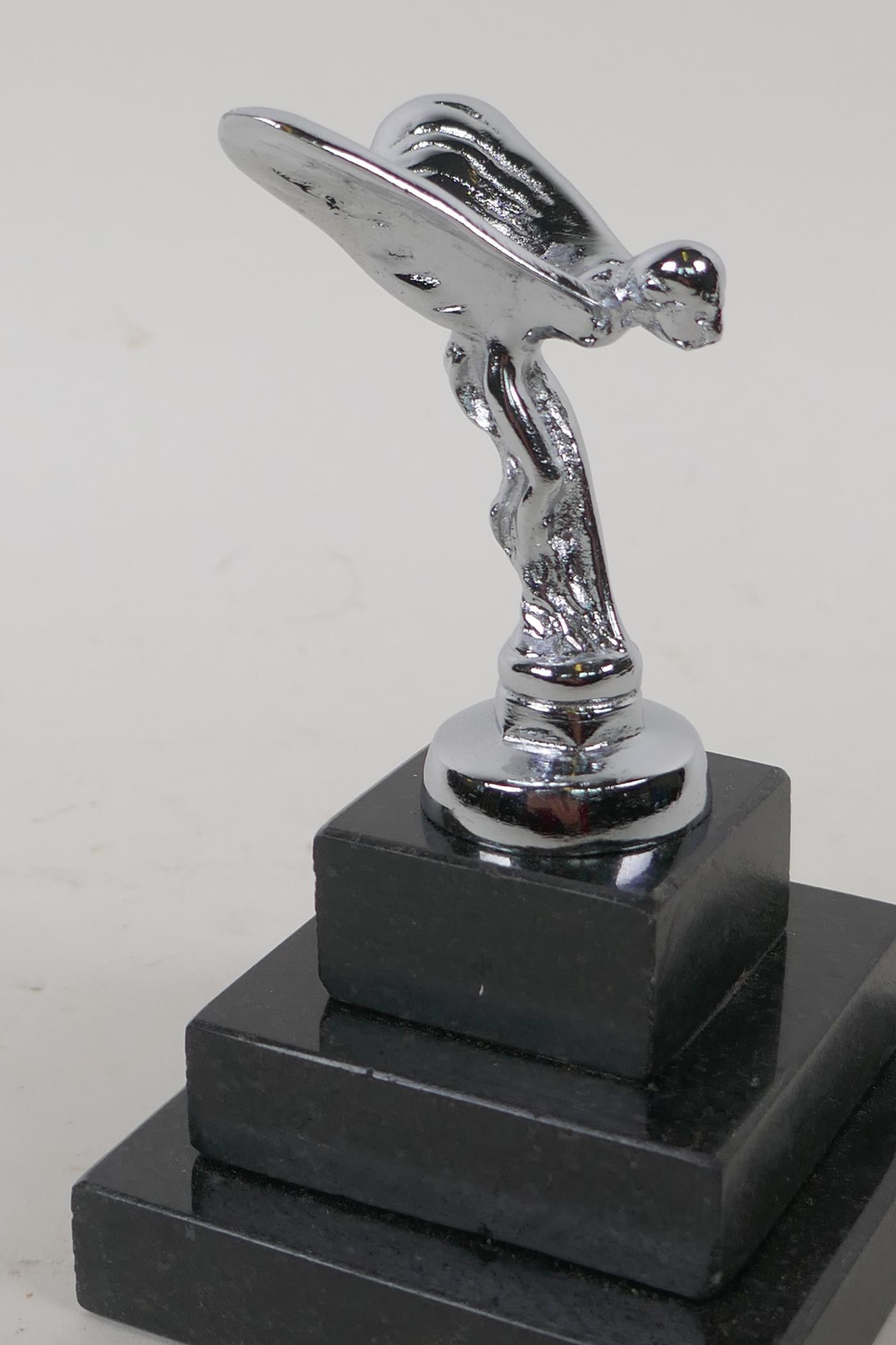 A small Spirit of Ecstasy silver plated paperweight on a stepped plinth, 12cm high overall - Image 2 of 3