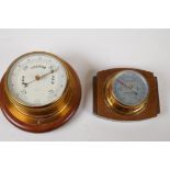 A marine brass cased bulkhead barometer, 38cm diameter, on mahogany mount, glass AF, and a similar