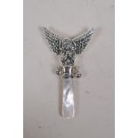 A sterling silver and mother of pearl baby's rattle in the form of an angel, 8cm