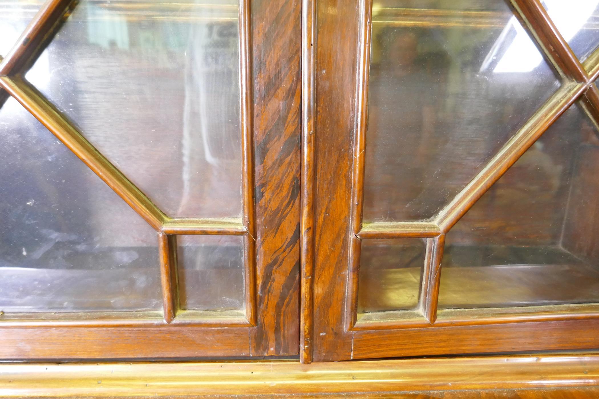 A C19th figured walnut secretaire bookcase, the astragal glazed upper section with adjustable - Image 6 of 7