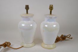 A pair of lustre glazed ceramic table lamps, 26cm high