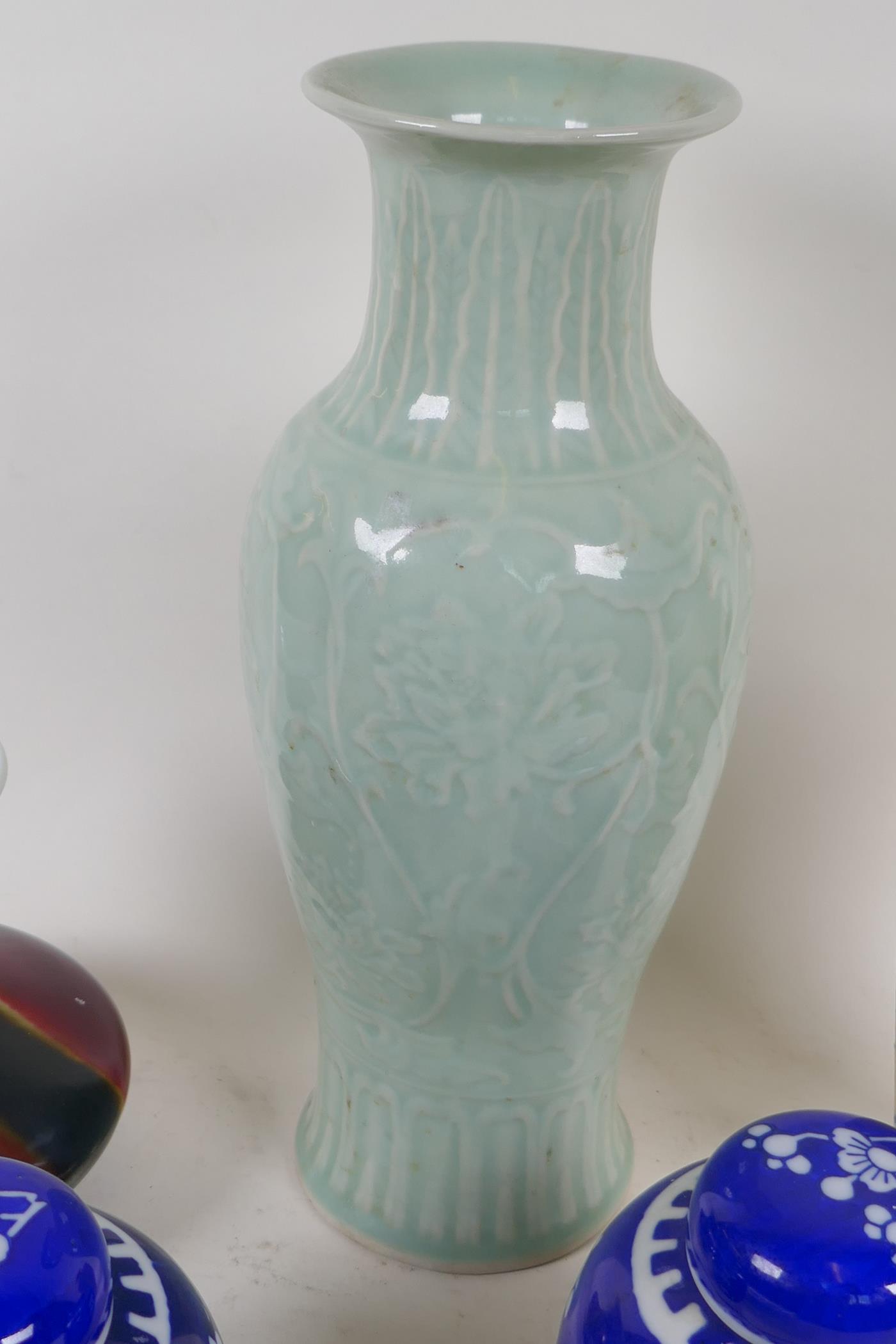 A Chinese celadon glazed porcelain vase, 31cm high, a stoneware vase, a pair of hawthorne pattern - Image 4 of 4