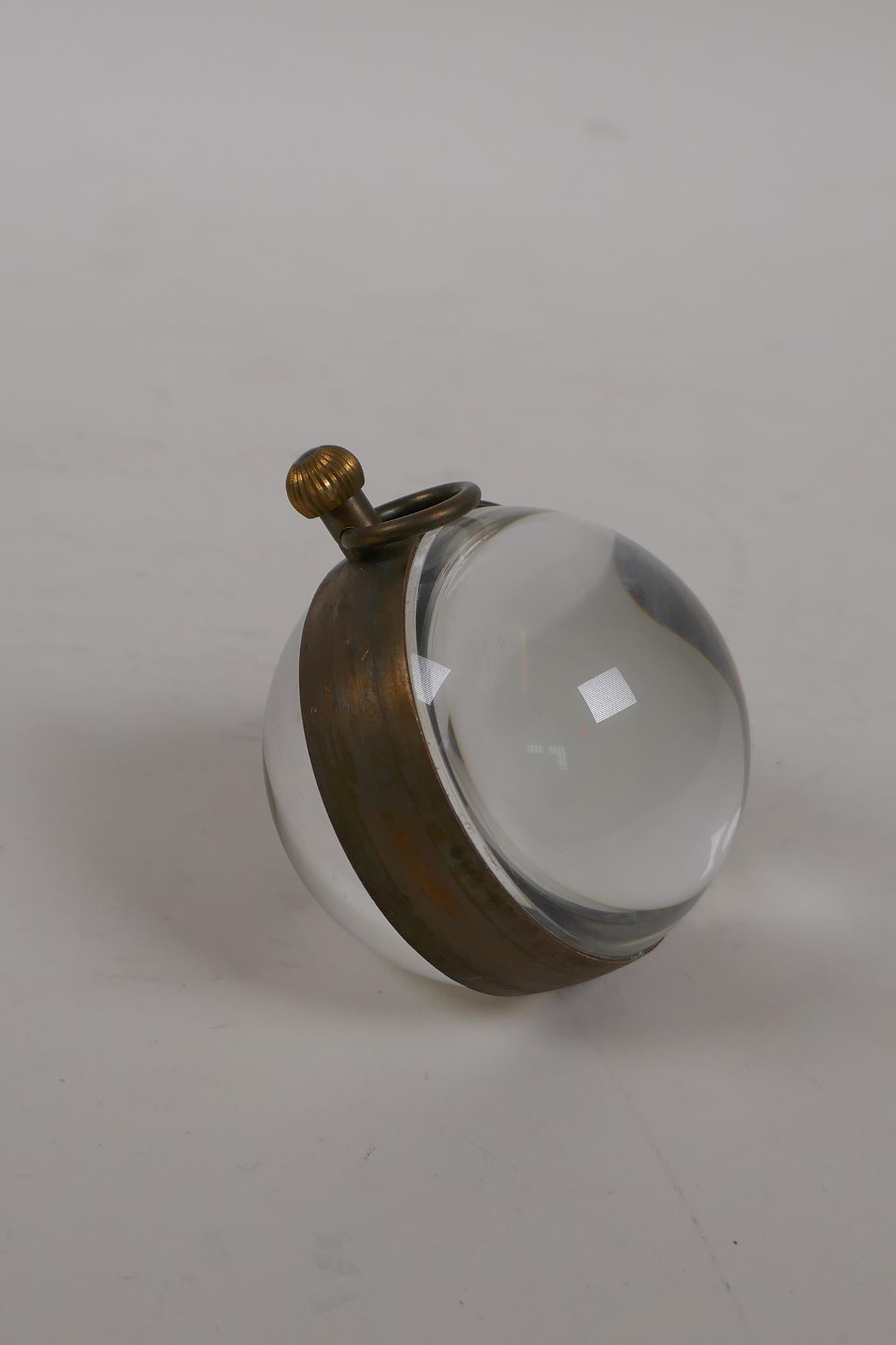 A brass and glass ball desk clock, 2½" diameter - Image 2 of 3