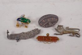 A gilt and enamel frog brooch, and four silver set brooches including goldstone, marcasite etc