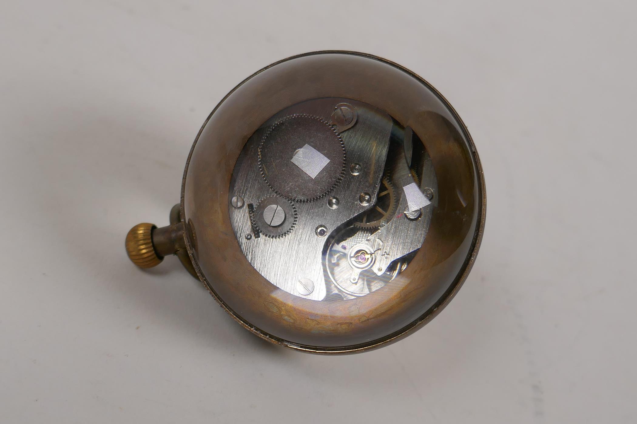 A brass and glass ball desk clock, 2½" diameter - Image 3 of 3