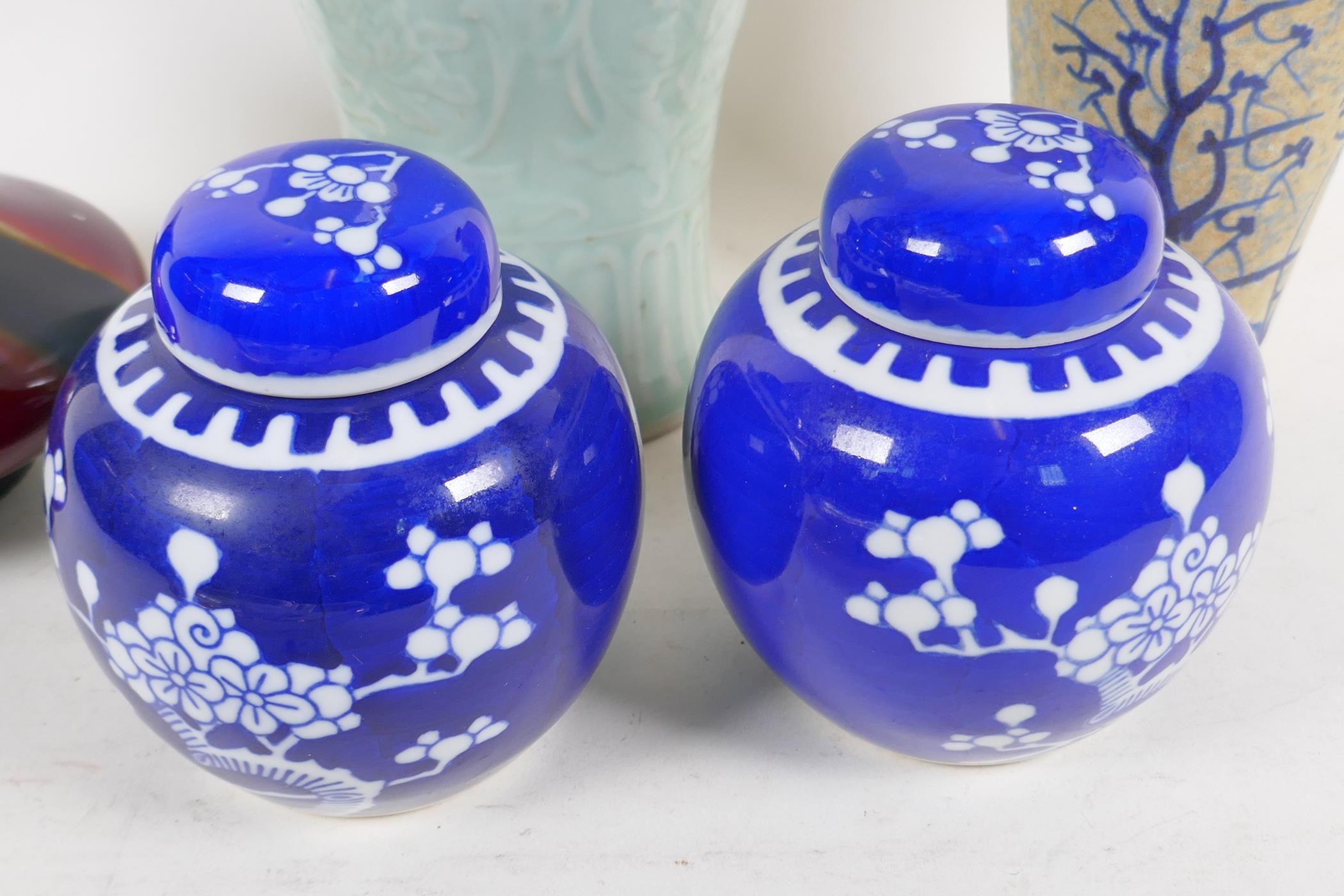 A Chinese celadon glazed porcelain vase, 31cm high, a stoneware vase, a pair of hawthorne pattern - Image 3 of 4
