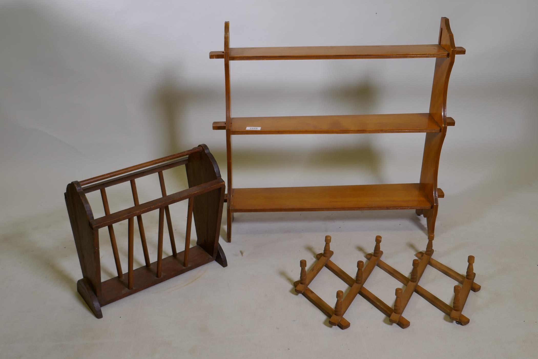 A C19th satinwood open shelf, 59 x 66 x 16cm, AF lacks pegs, a magazine rack and folding coat rack