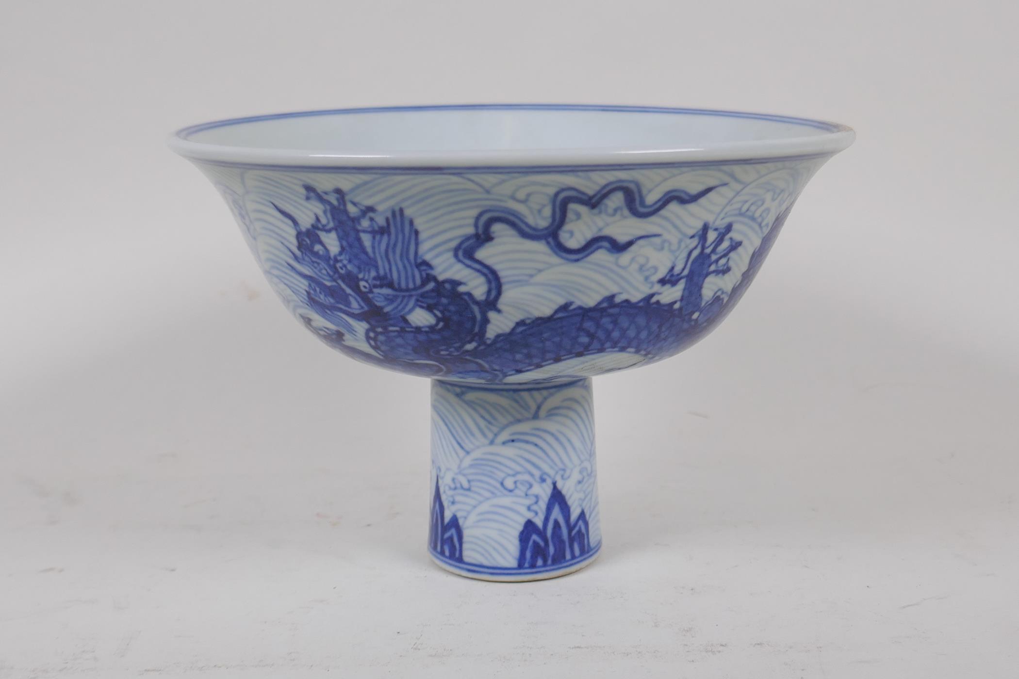 A blue and white porcelain stem bowl with dragon decoration, Chinese Xuande 6 character mark to - Image 3 of 6