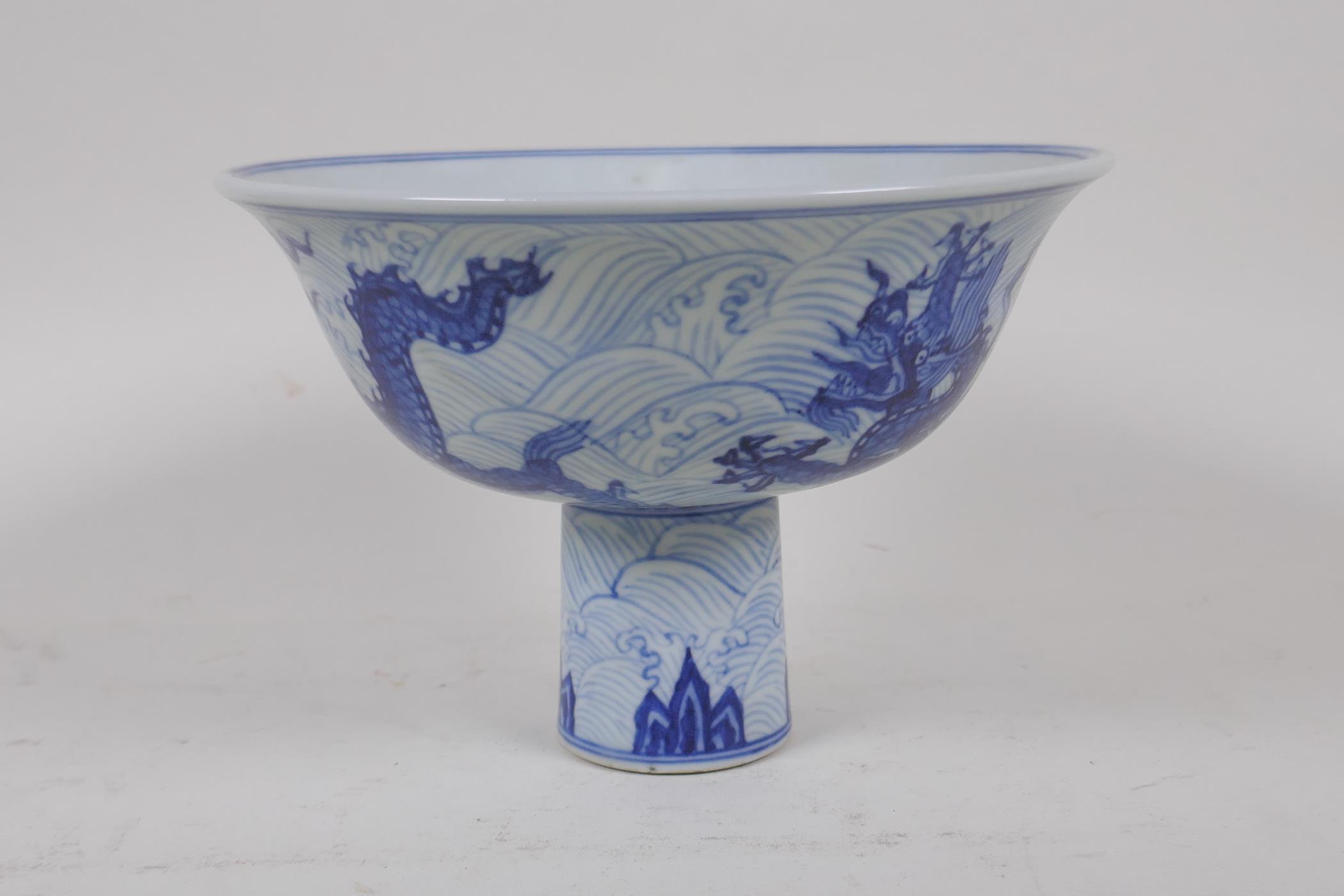 A blue and white porcelain stem bowl with dragon decoration, Chinese Xuande 6 character mark to - Image 2 of 6