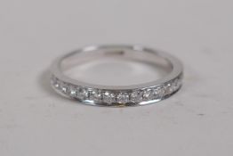 An 18ct white gold and diamond half eternity ring, approx 50 points, size M