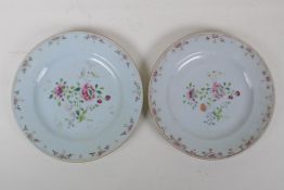 A pair of C19th Chinese export ware porcelain cabinet plates, with famille rose enamel floral