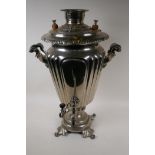 A silver plated samovar on a pedestal base, 57cm high