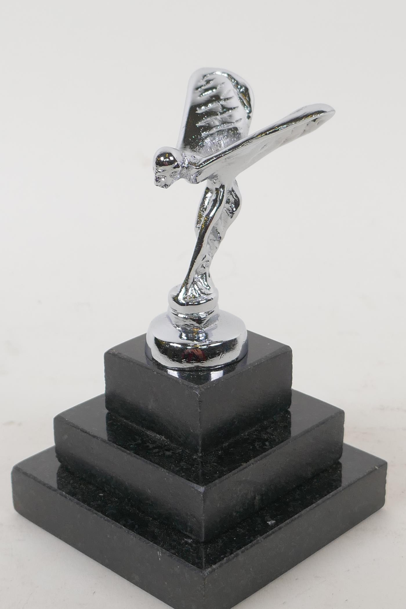 A small Spirit of Ecstasy silver plated paperweight on a stepped plinth, 12cm high overall - Image 3 of 3