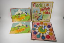 A 1930s Chad Valley wooden Mickey Mouse jigsaw puzzle, and a Parker Brothers clock, Tiddley Winks