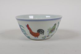 A doucai porcelain tea bowl with chicken decoration, Chinese Chenghua 6 character mark to base,